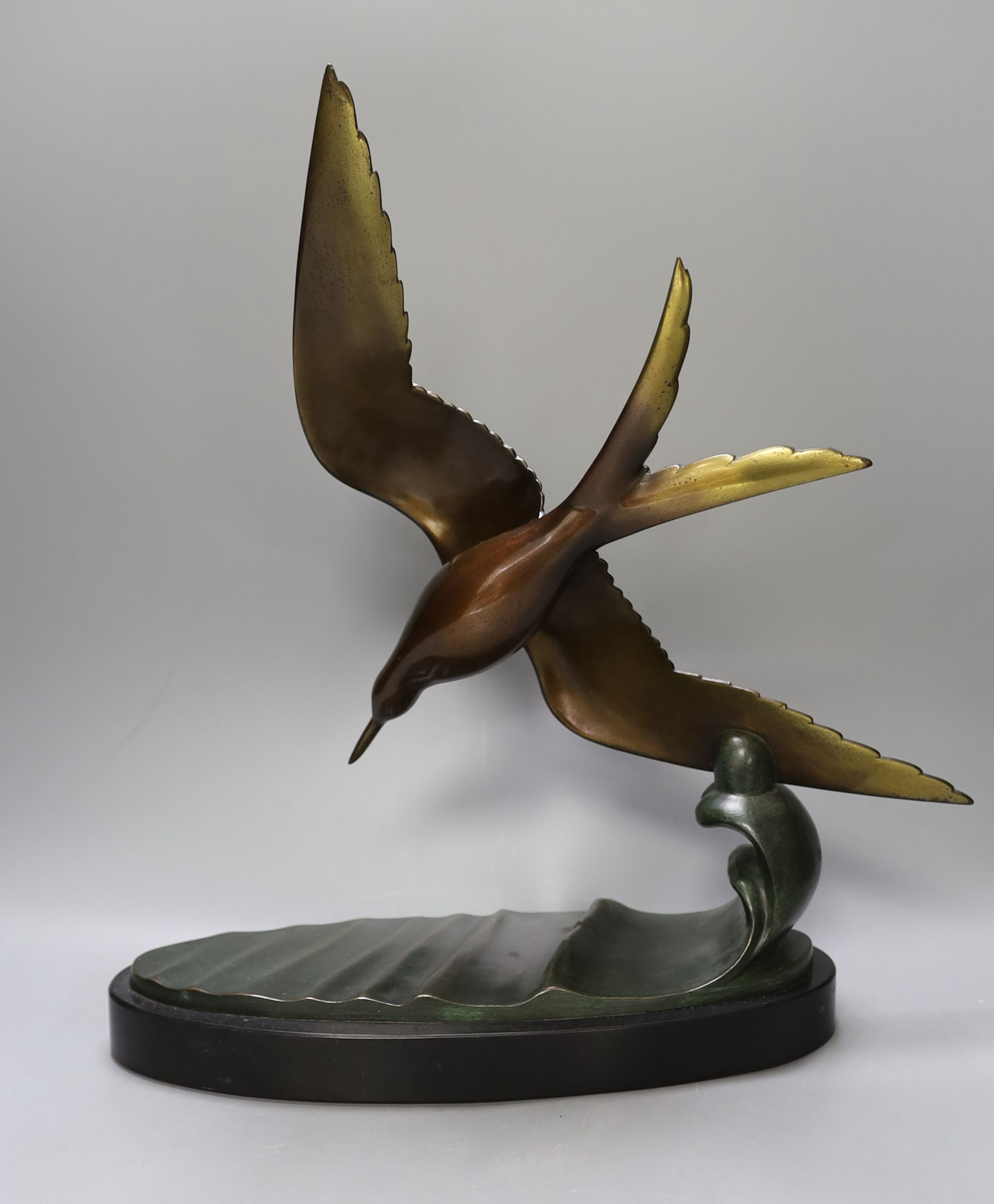 An Art Deco bronze tern, after Reniti - 43cm tall